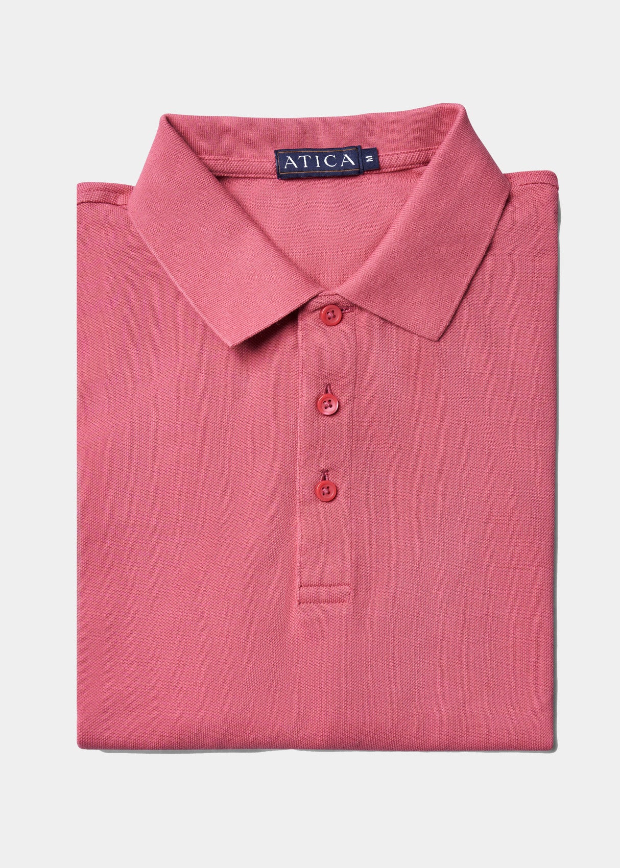 Performance Polo Coral Shirt.