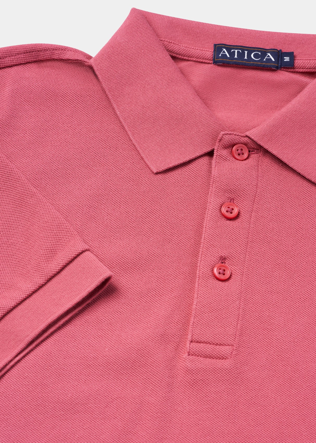 Performance Polo Coral Shirt.